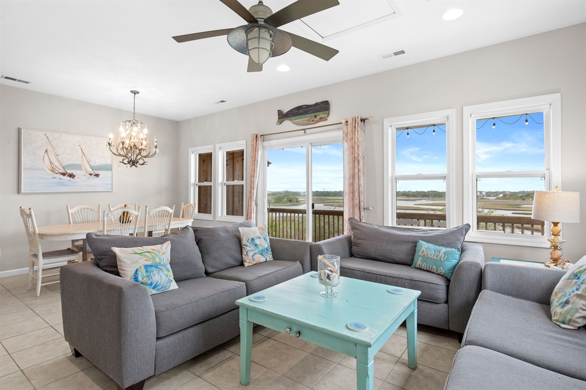 Bright, open living space with water views right from the couch
