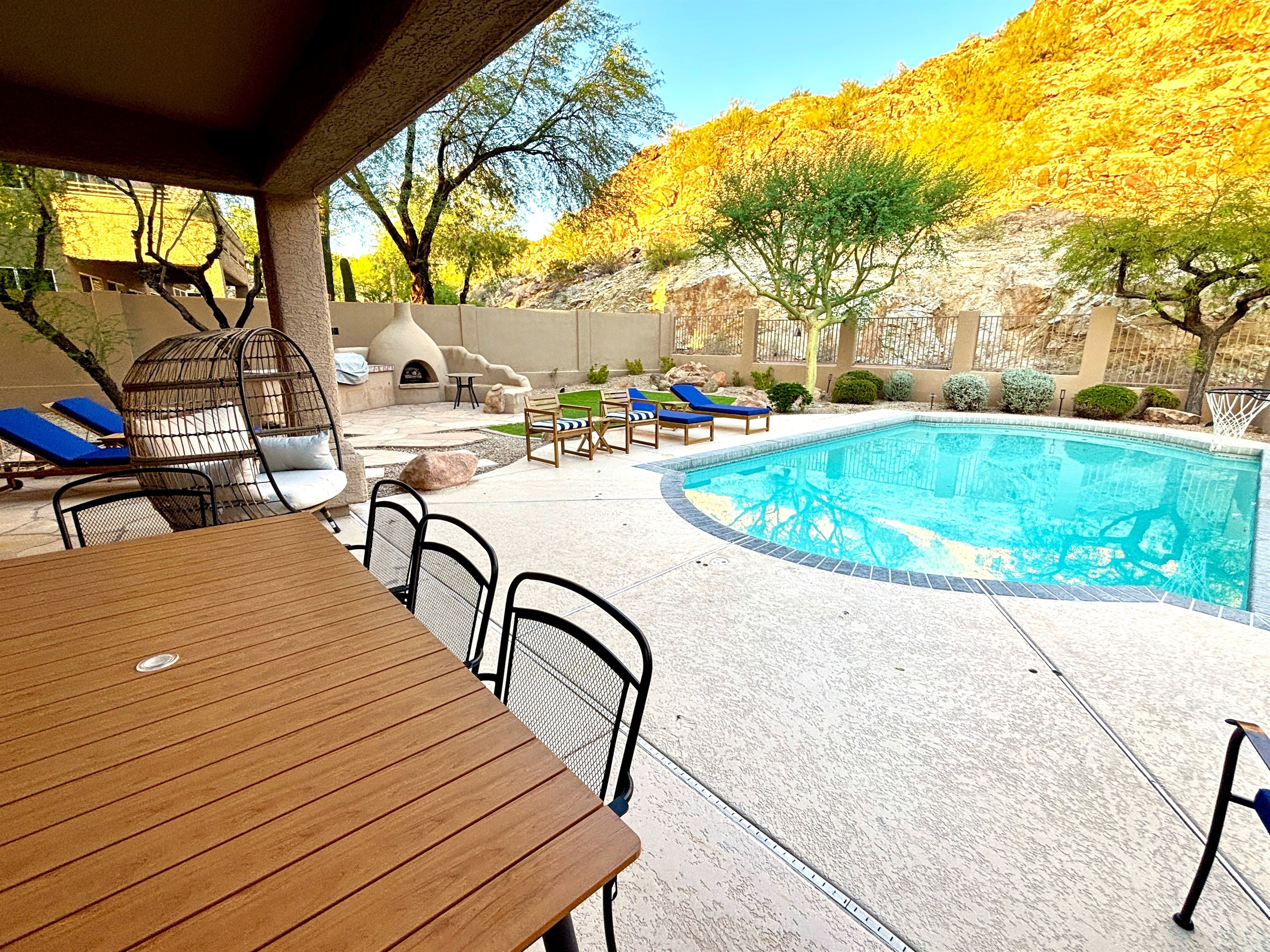 Backyard with private heated saltwater pool and plenty of seating