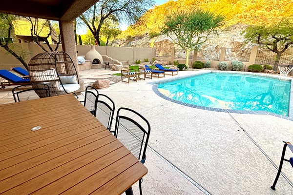 Backyard with private heated saltwater pool and plenty of seating
