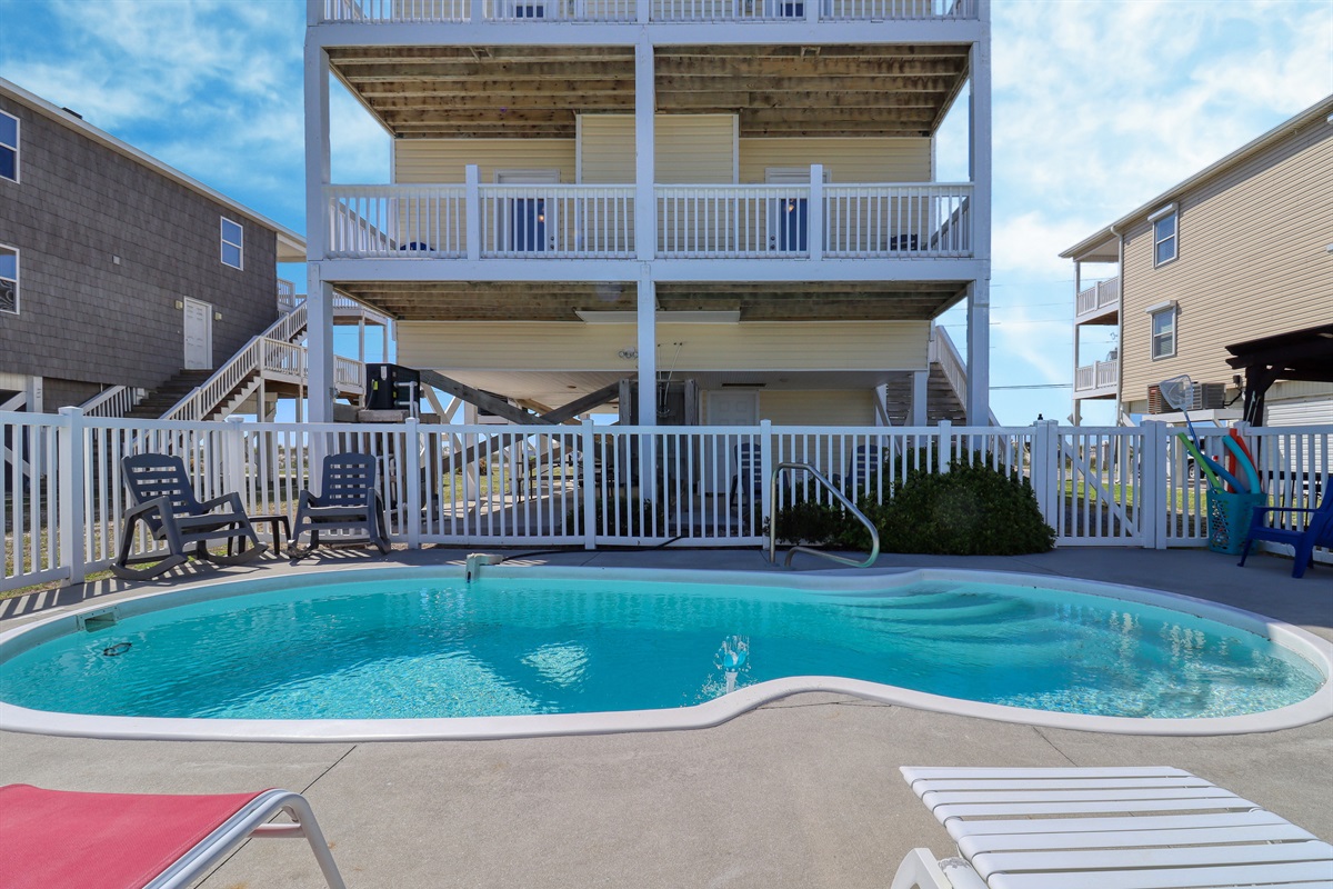 in ground heated pool in rear of the house