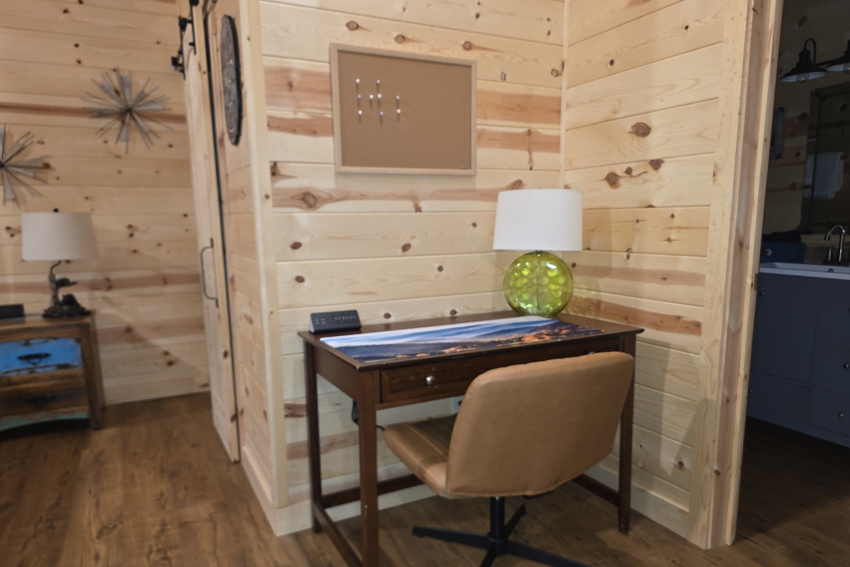 Dedicated office desk and comfy chair.