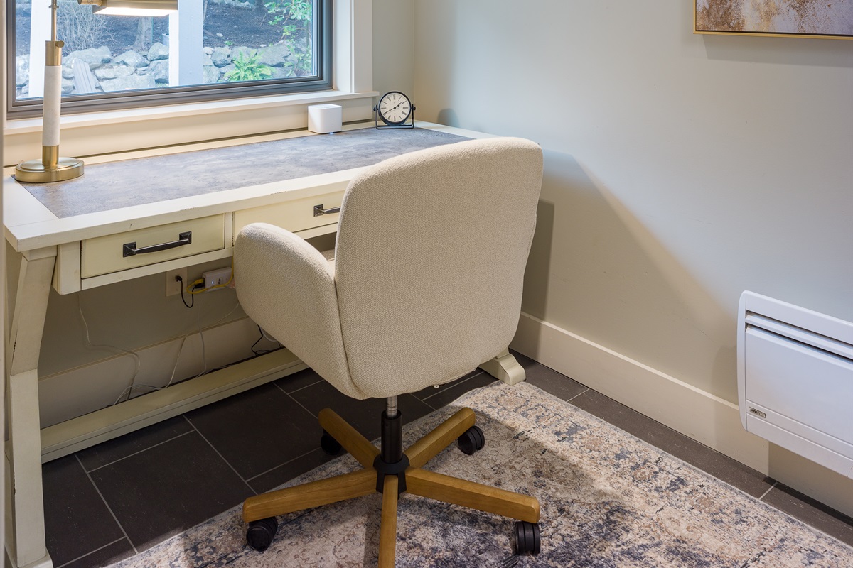 Work, write or relax in this office space with a view of the lush outdoor scenery.