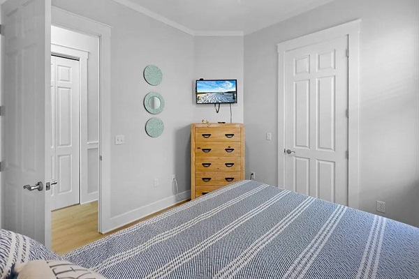 Queen bedroom with a TV
