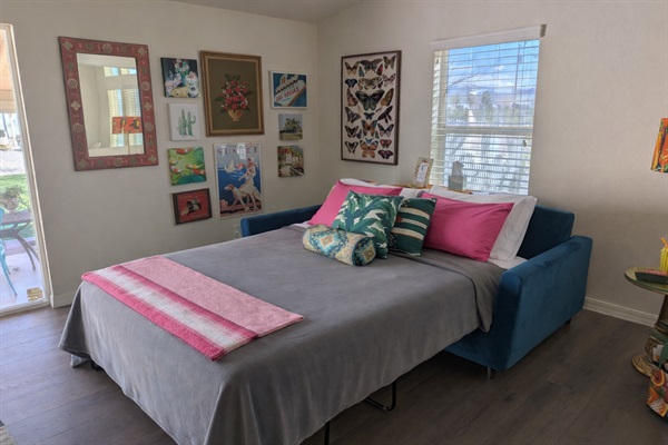 Queen size sofa bed in living room.