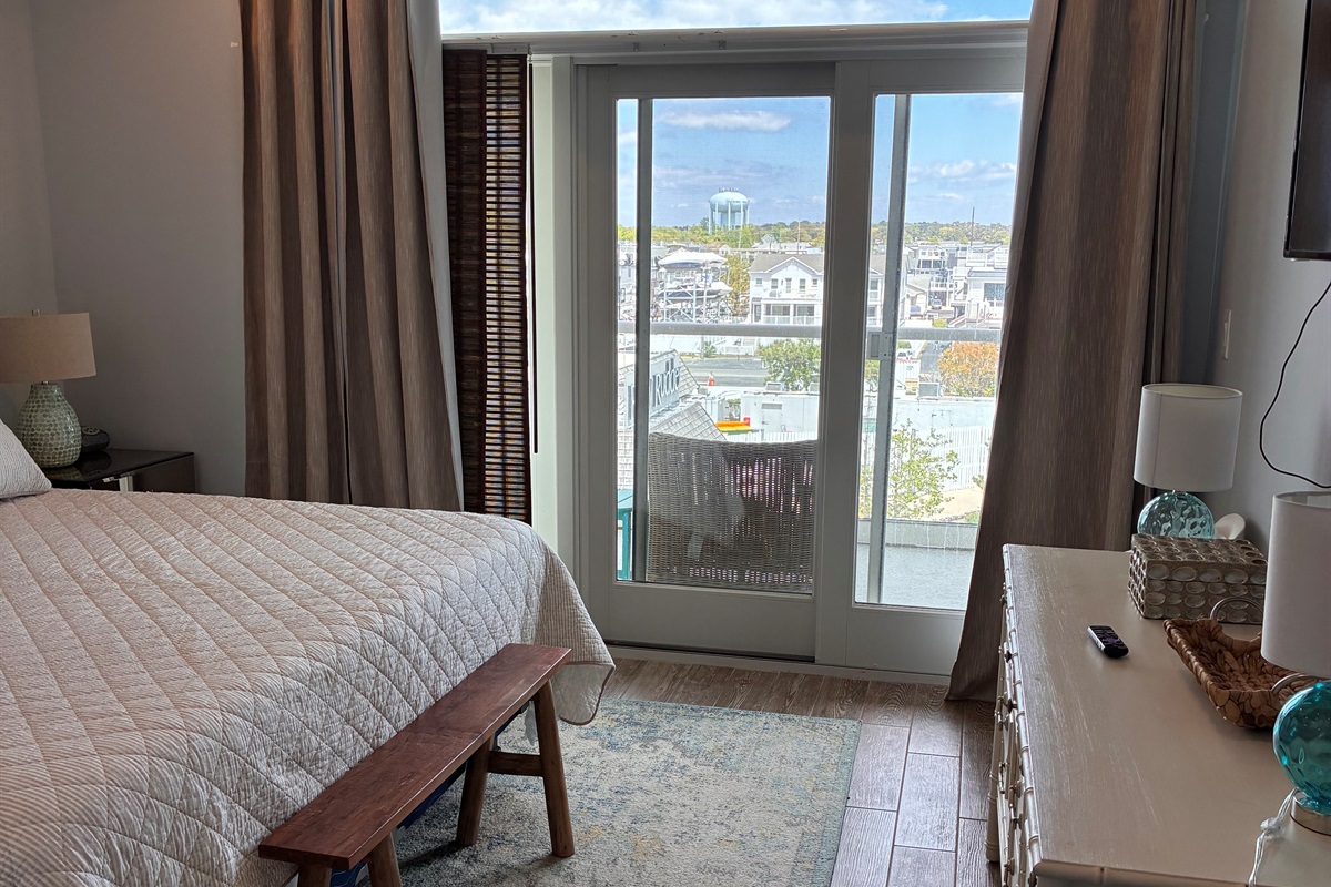 Bedroom 2 with King bed and access to Balcony