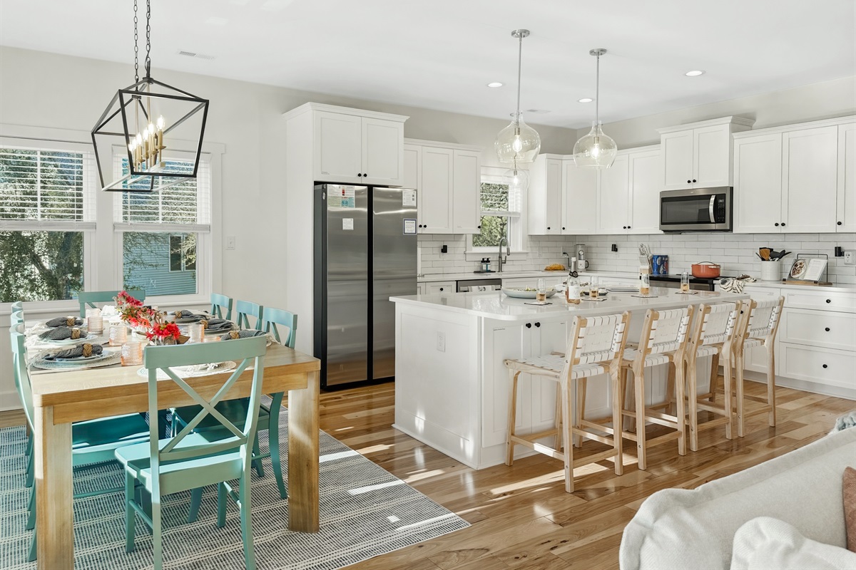 The open kitchen and dining are perfect for socializing while preparing meals.