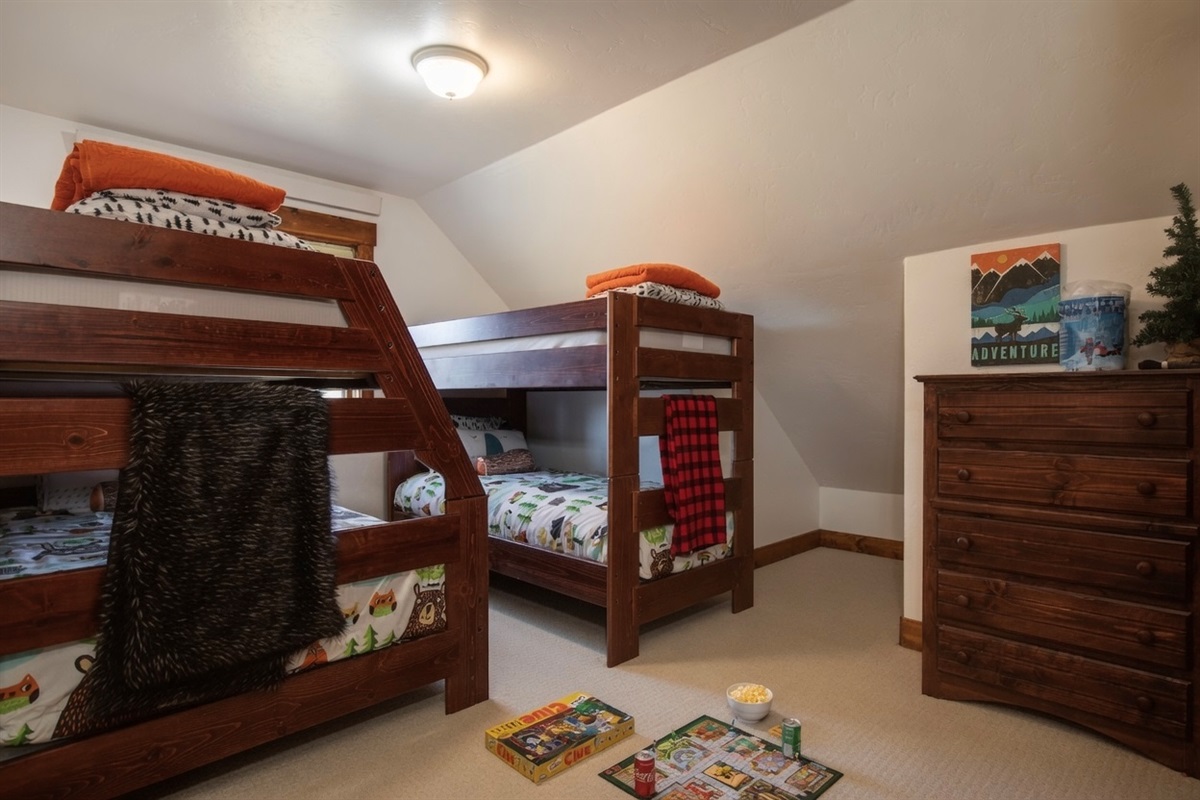 The giggling starts immediately! Soak in the joy as they run to claim the top bunk before you've even unpacked. The bunk room sleeps 4-5 with twin-over double and twin over twin setups.