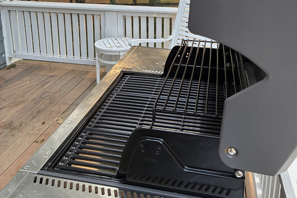 Gas grill on deck outside kitchen.