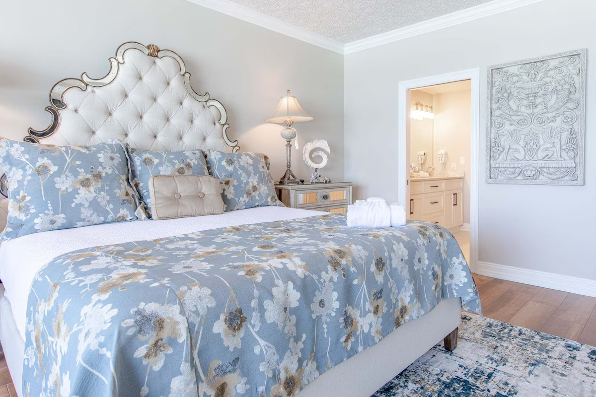 The Primary Ensuite includes a large bedroom area with views from both the bed and The Seating Area, plus a Bathroom with a double-bowl vanity, a large walk-in closet, a large walk-in shower, a Jacuzzi tub, and a private toilet room.
