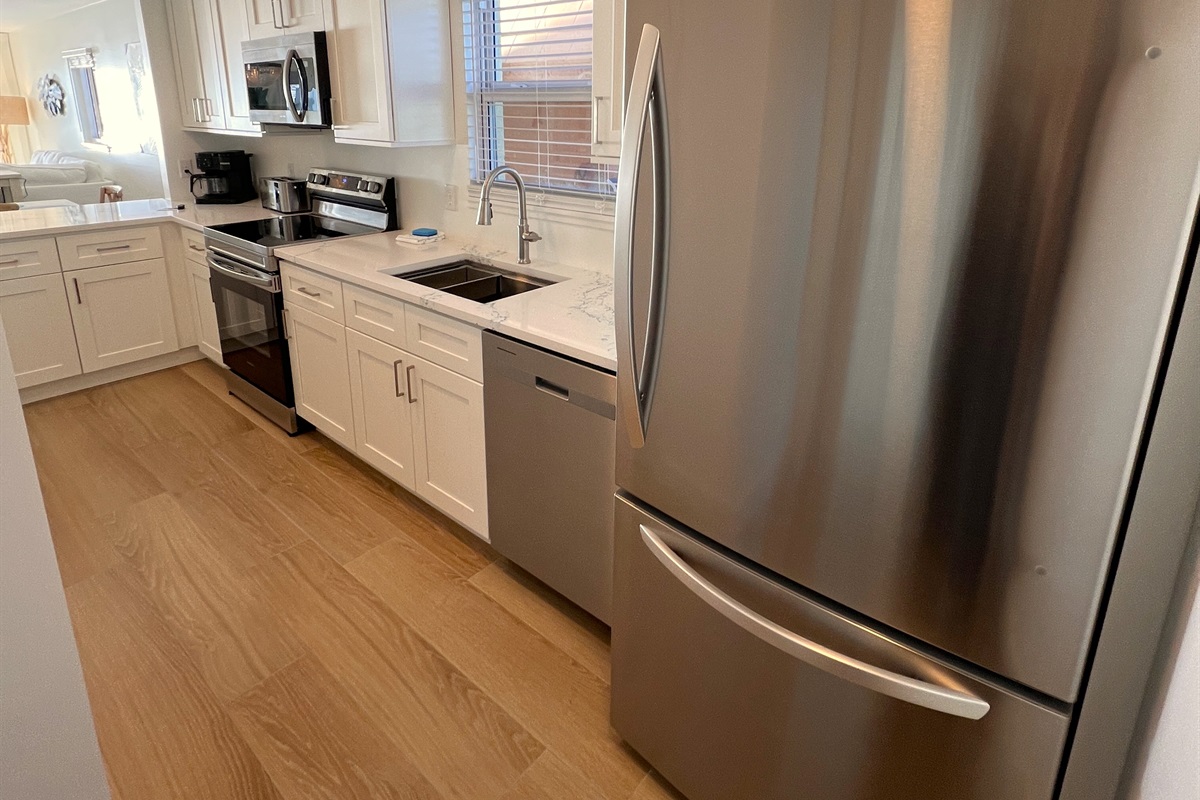 New appliances and porcelain tile throughout