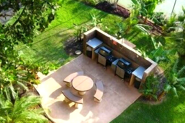 Well maintained gas BBQ grill area right outside the door.