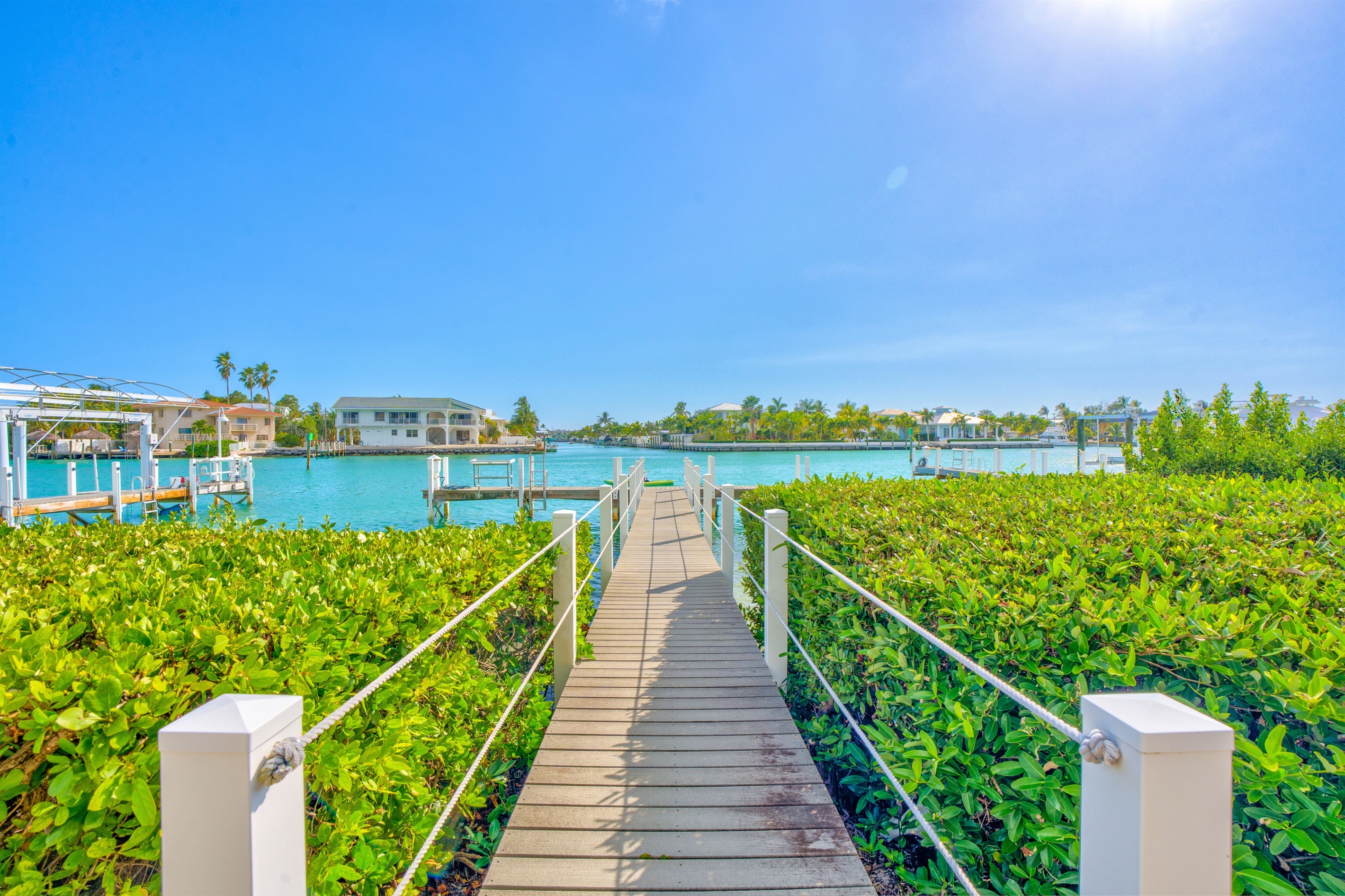 Head down the newer dock through the mangroves and out to the wide canal.