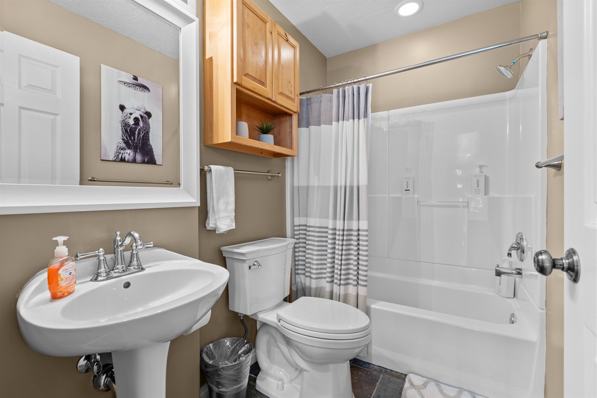 Bright, main-level bathroom —we supply all the bath essentials.