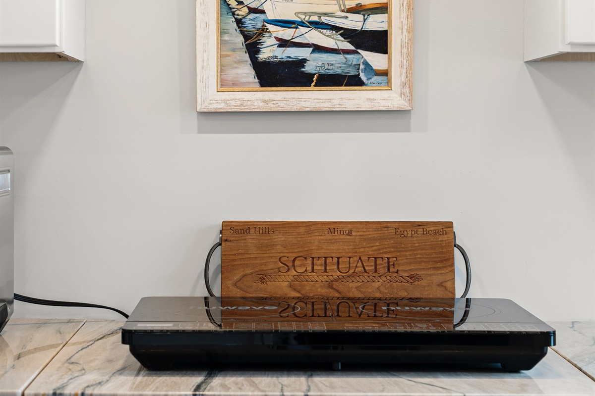 Prepare meals quickly and safely with the induction cooktop.