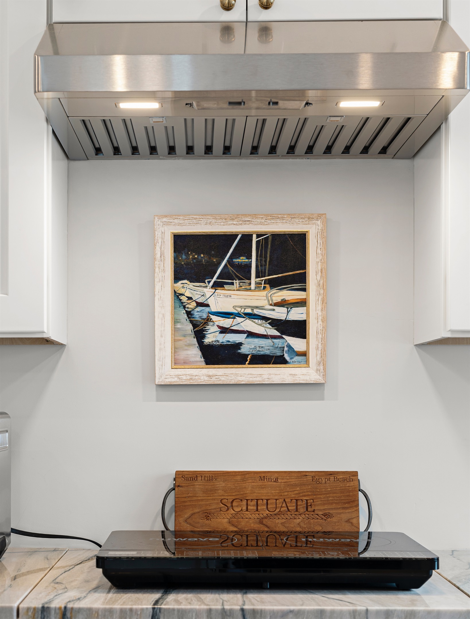 Prepare meals quickly and safely with the induction cooktop.