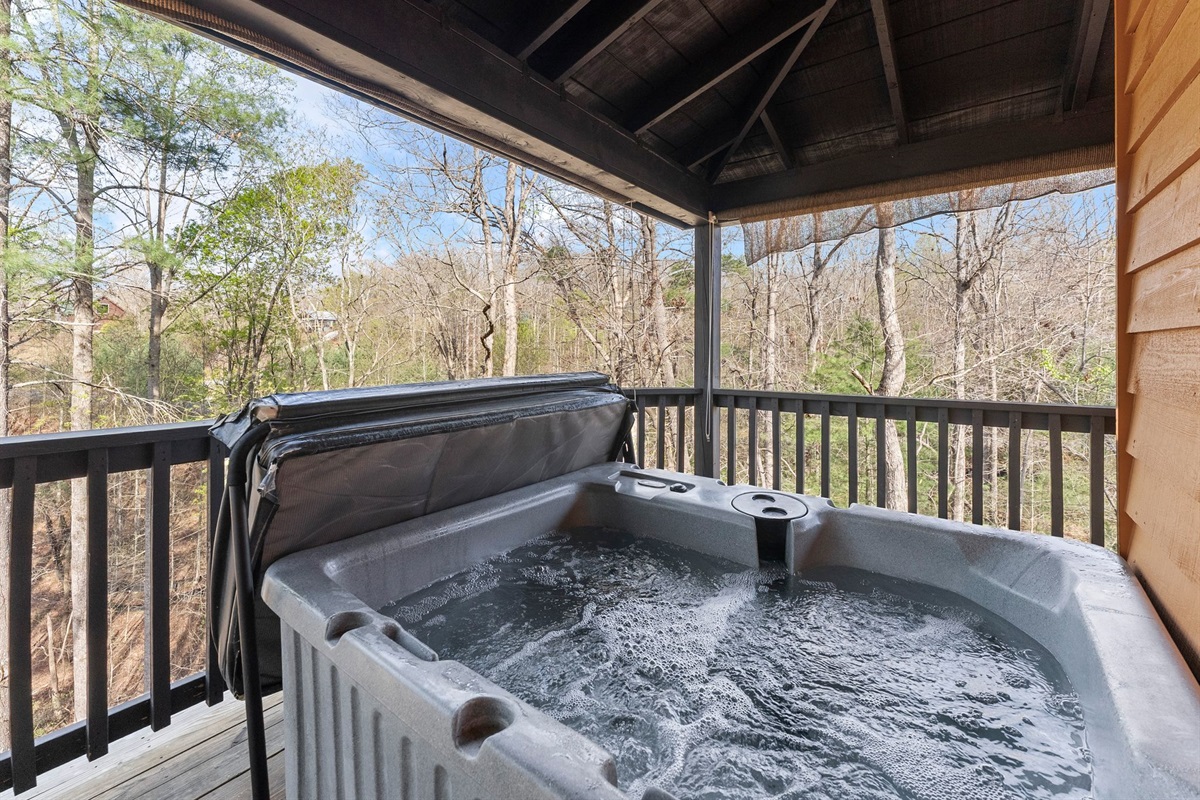 Soak in the Hot Tub and Savor the Peaceful View of Nature
