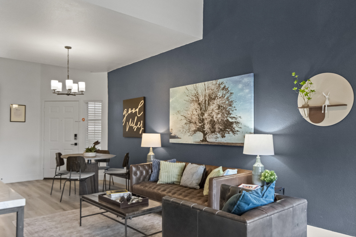 Spacious open living area with comfortable seating, stylish furnishings, and a welcoming atmosphere for families and groups.