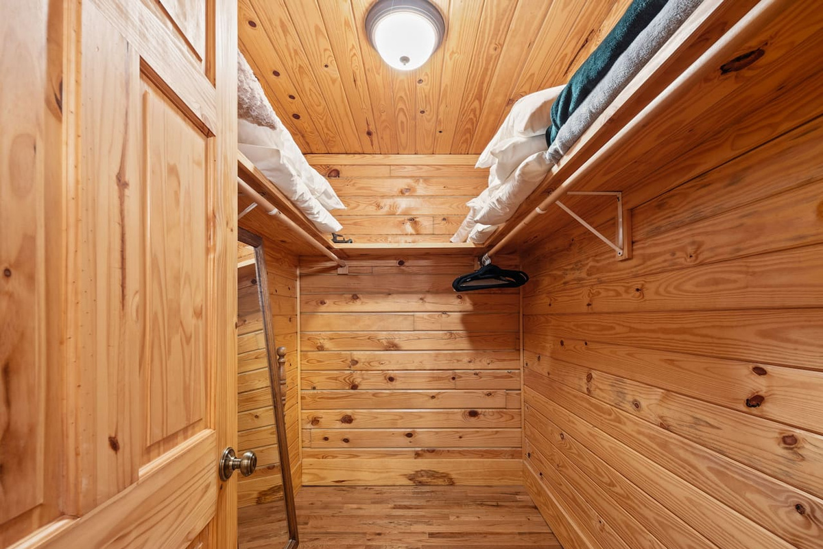 Primary bedroom walk-in closet