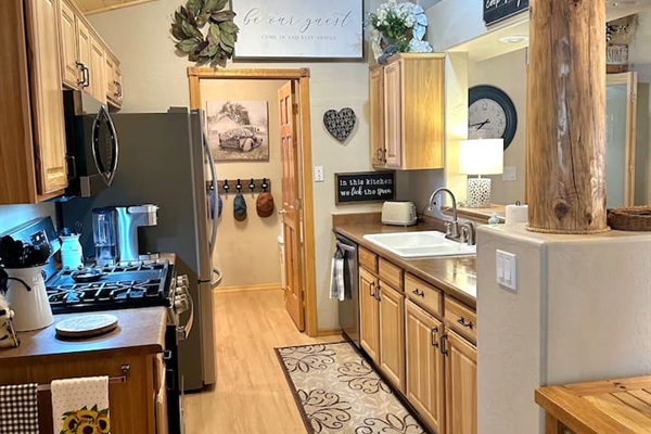 Full sized appliances, coffee makers, pots & pans, plates, silverware, and much more!