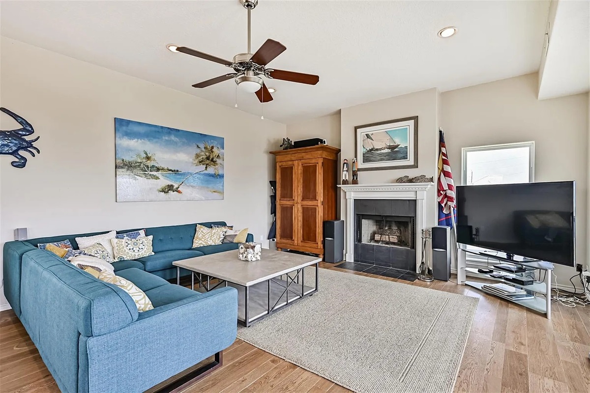 Fireplaces in living area, and both primary bedrooms