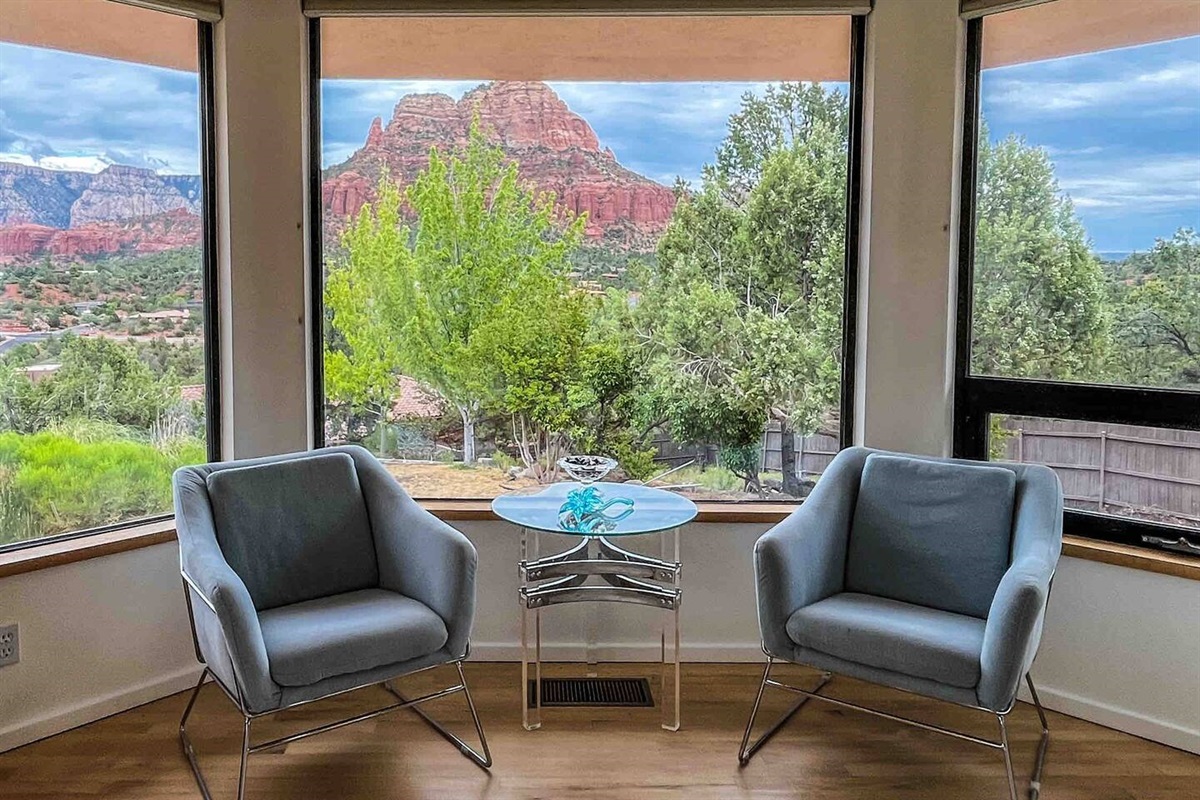 Picture window and sitting area in bedroom one… look at that view!! Can you imagine waking up to that every morning? 
