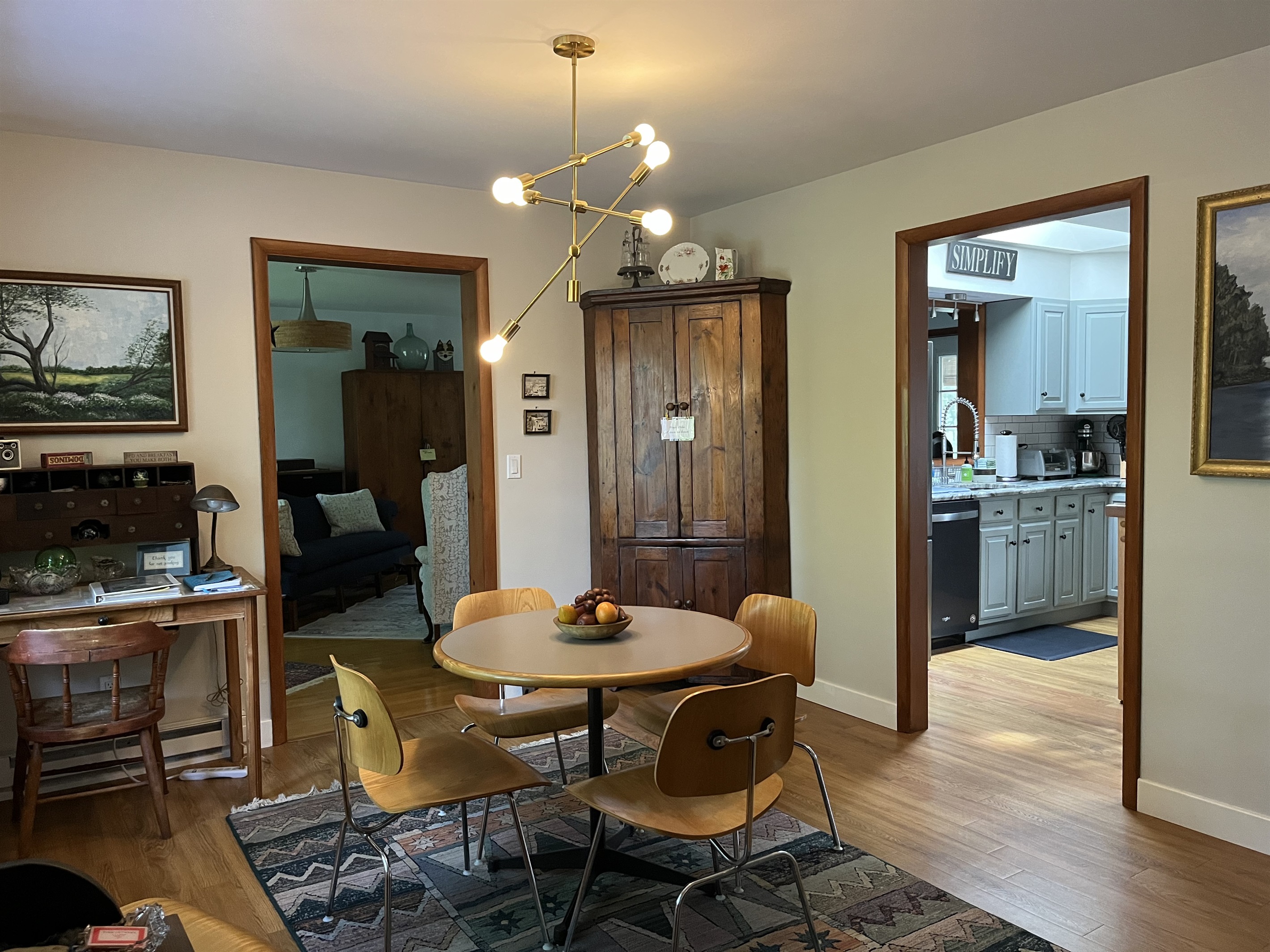 Dining area into kitchen and living room