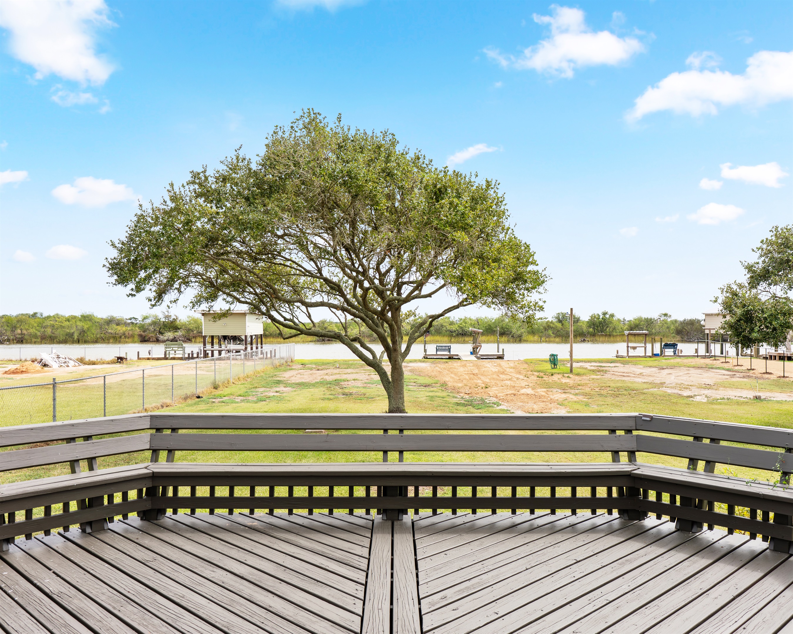 Beautiful large porch with views of the large backyard and creek