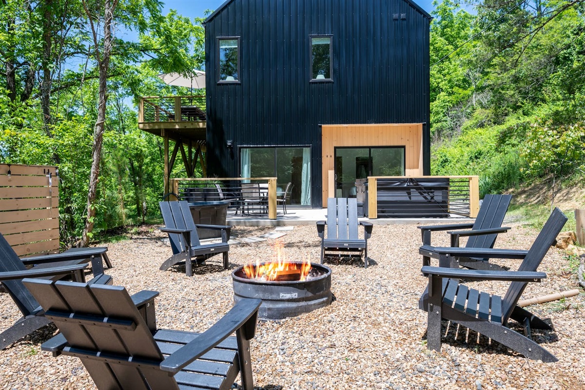 The backyard meadow offers fire pit, cold plunge, hot tub, corn hole and an area for kiddos to play! 