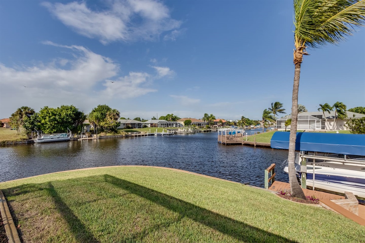 Step into the backyard and be mesmerized by stunning intersectional canal views that promise unforgettable moments!