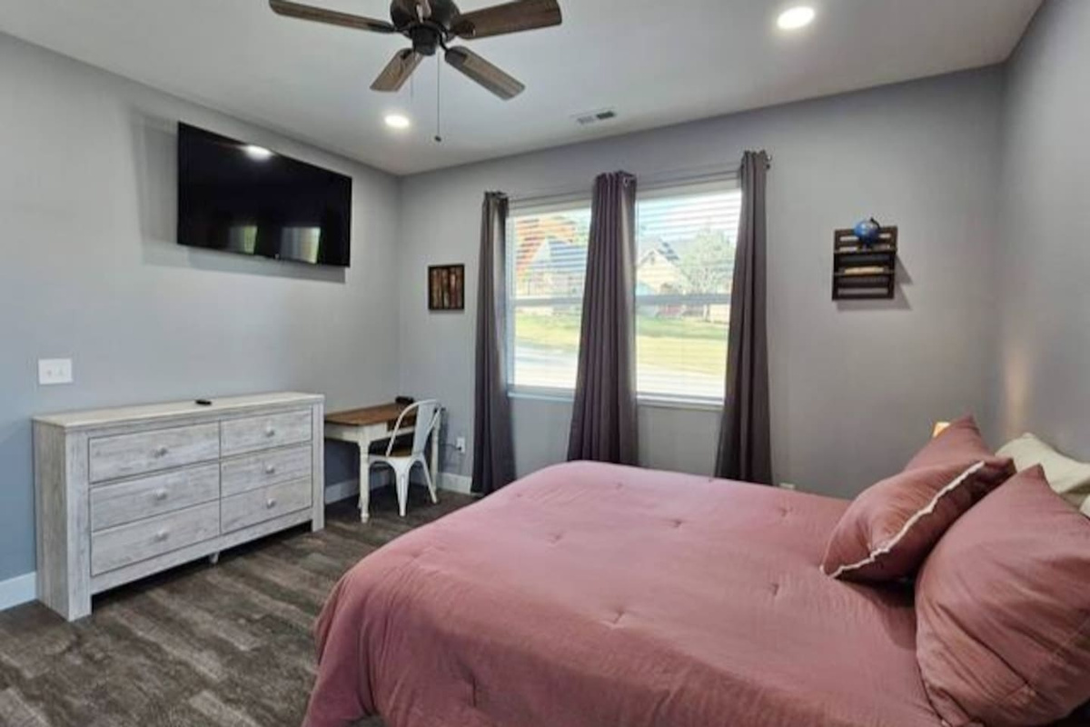 Perfect Queen suite for couples or additional guests with private workspace.