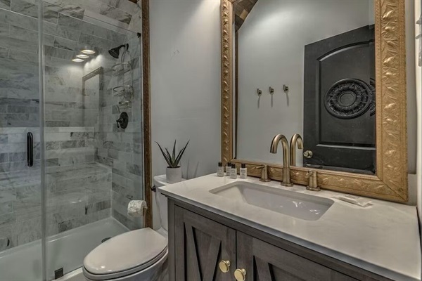 Spa-style bathroom in the detached guest suite above the garage with walk-in shower and elegant finishes for a relaxing, self-contained retreat.