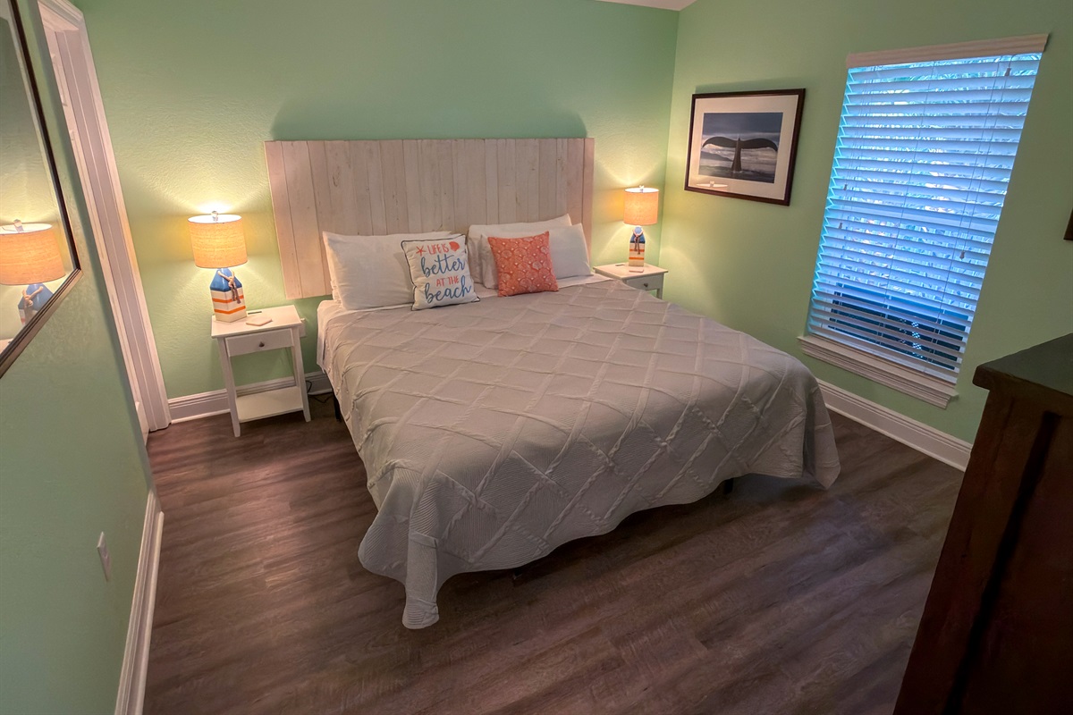 Second Floor Bedroom 5 combines simple comfort and beach-house style with inviting décor and a spacious King layout for unwinding.