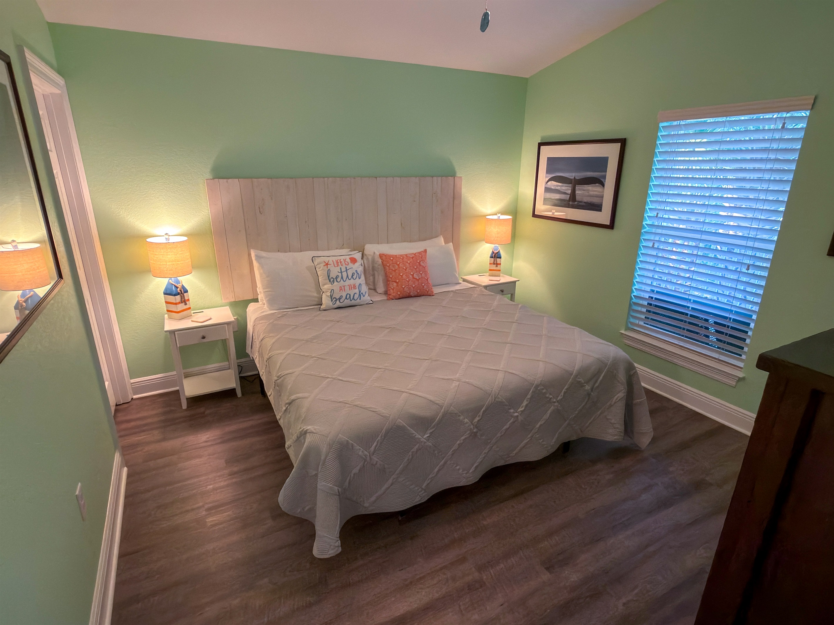 Second Floor Bedroom 5 combines simple comfort and beach-house style with inviting décor and a spacious King layout for unwinding.