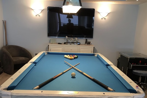 The large game room television overlooking billiards table