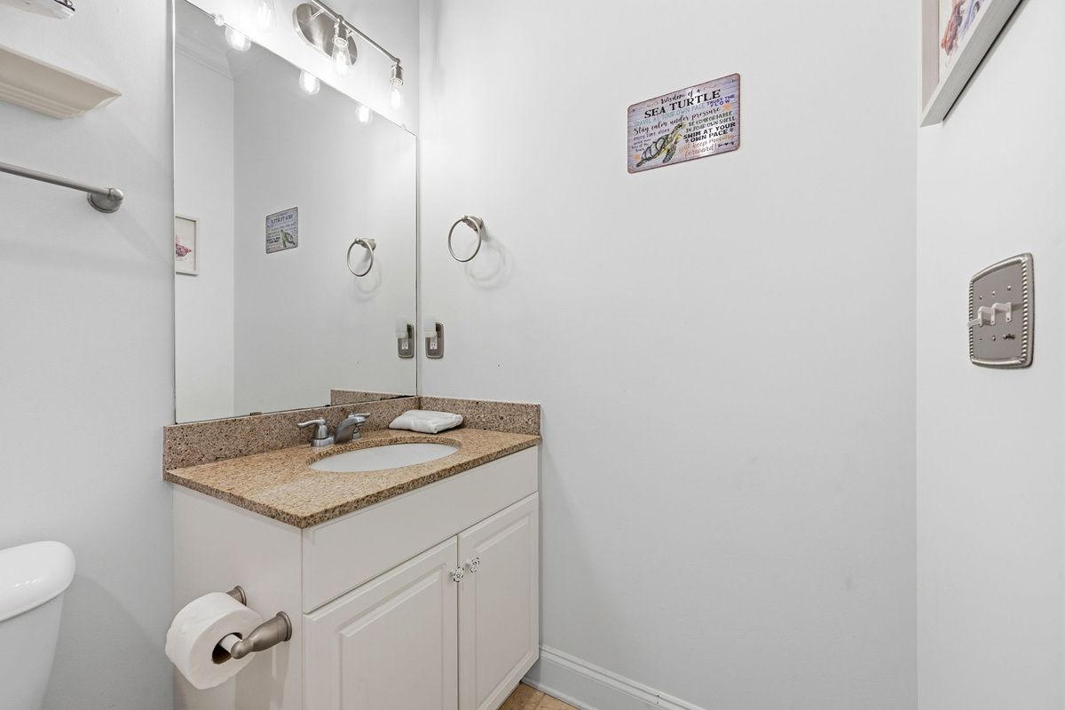 Kid friendly bathroom with a fresh coastal feel and quick rinse convenience after the beach