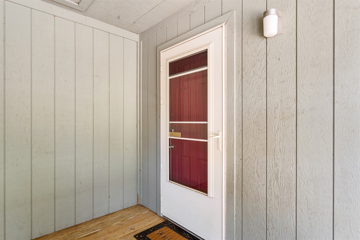 The covered landing gives you a sheltered arrival before you step inside.