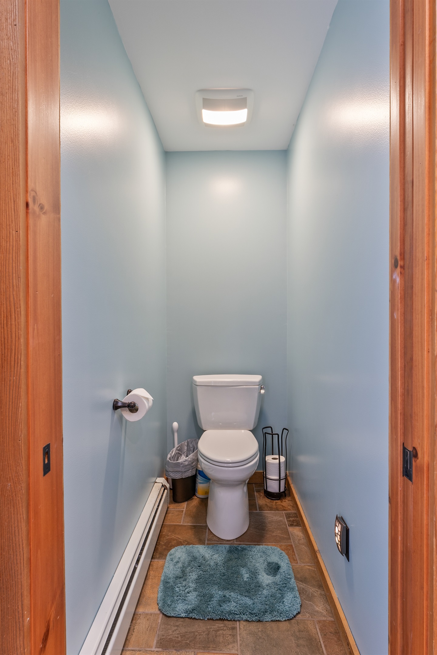 Cozy half bath with modern fixtures and convenient layout.