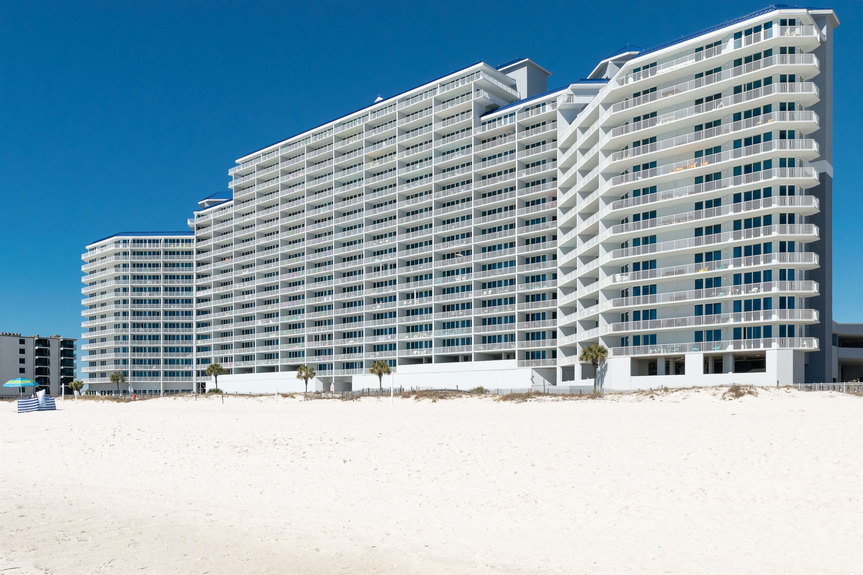 Nestled against the backdrop of the beach, this building captures the essence of coastal living.