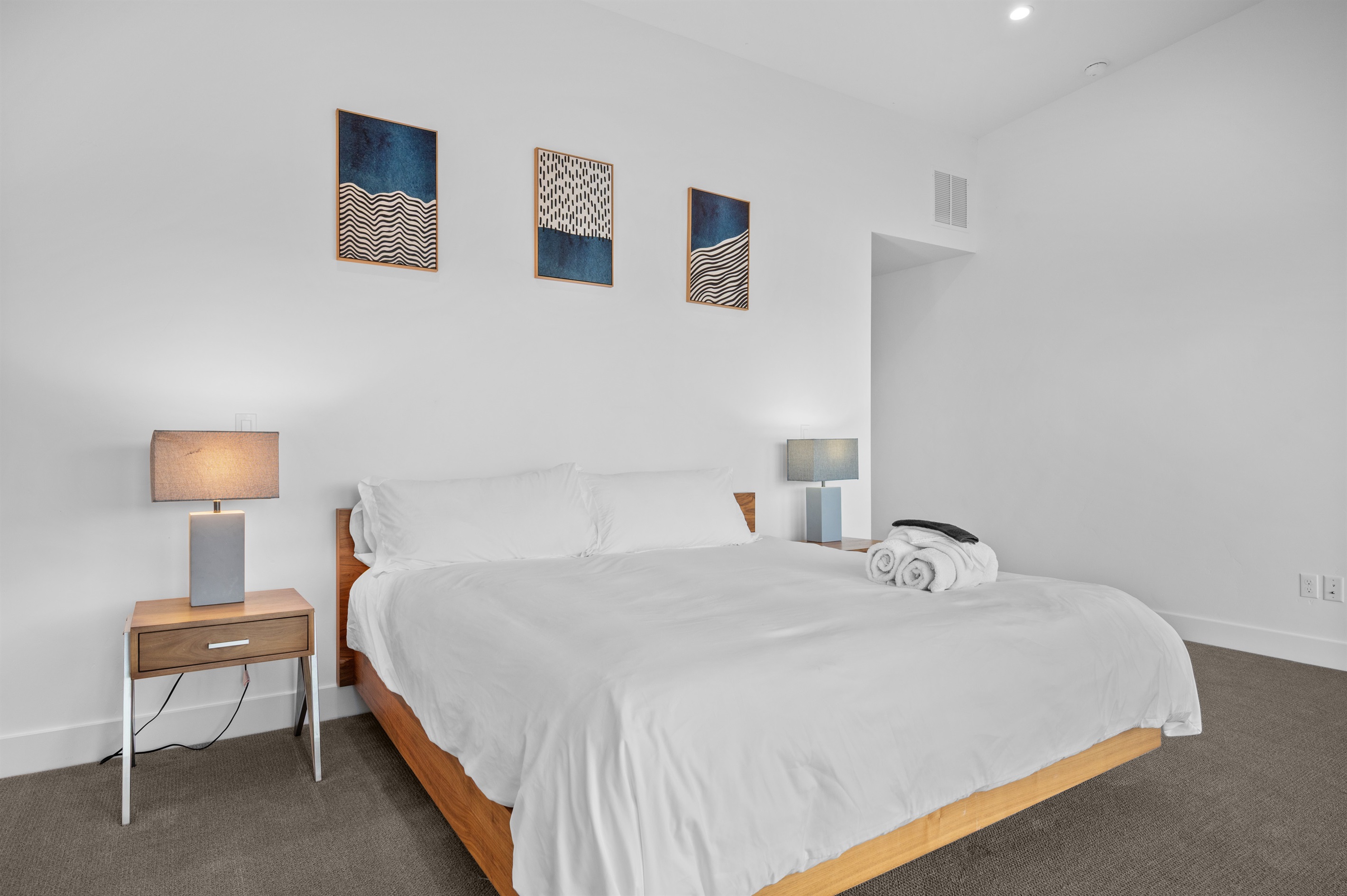 Wake up refreshed in this peaceful king bedroom.