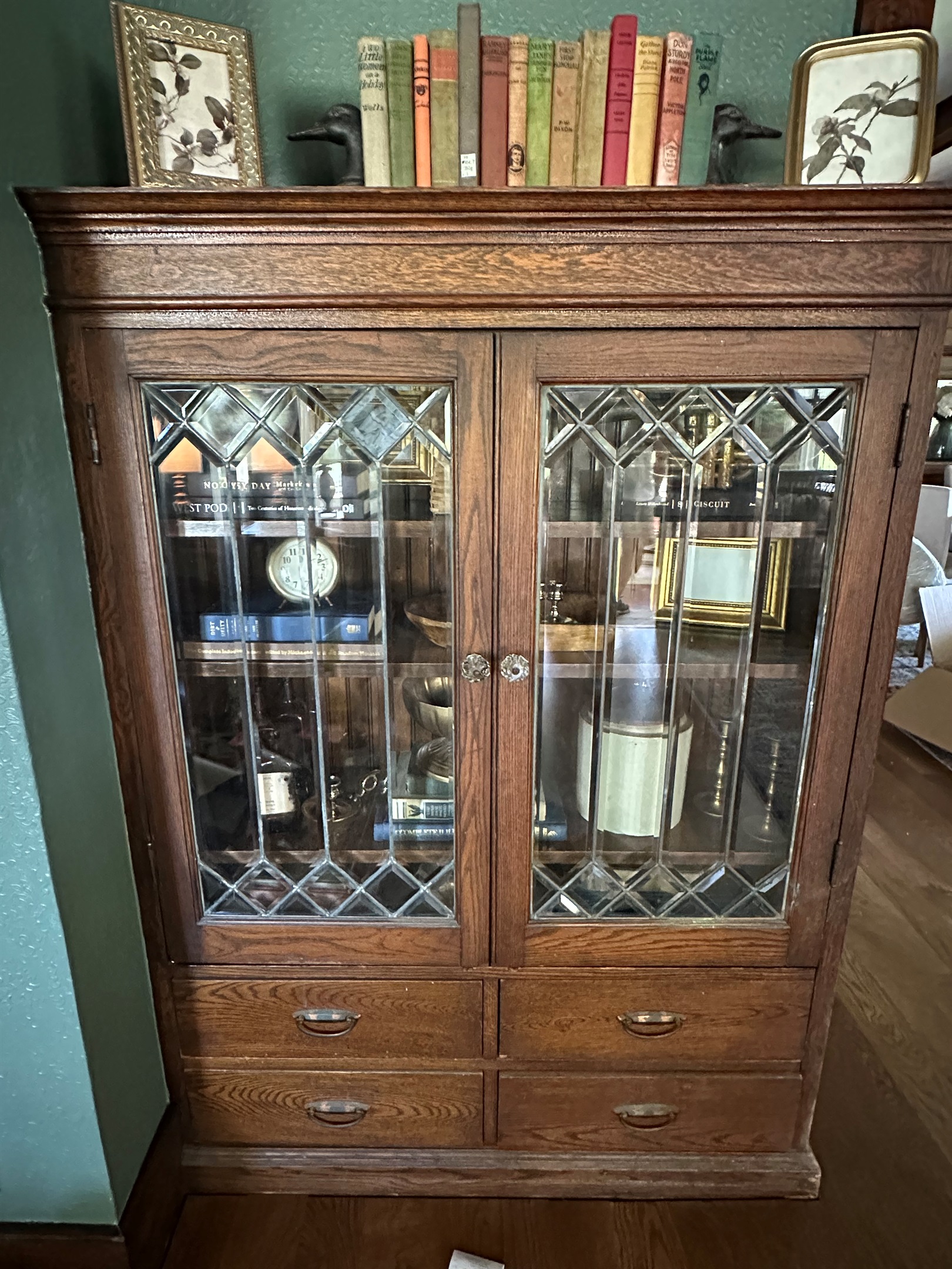 Original leaded glass built ins and warm woodwork add timeless charm throughout Friday Farm. Thoughtfully styled spaces blend historic character with modern comfort for a stay that feels both elegant and inviting.