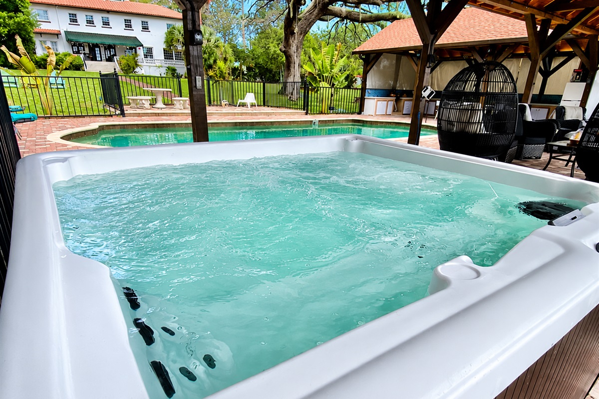 Lounge in the hot tub by the pool.