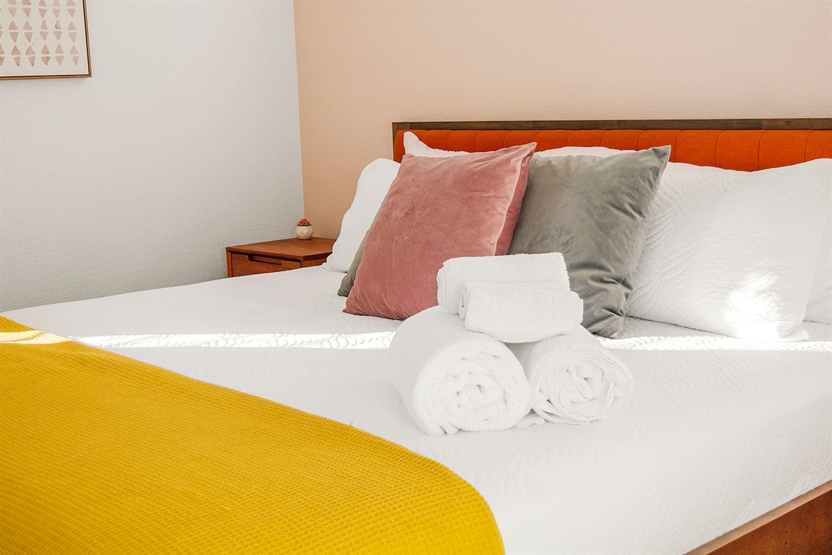 King size bed in main room, helix hospitality mattresses.