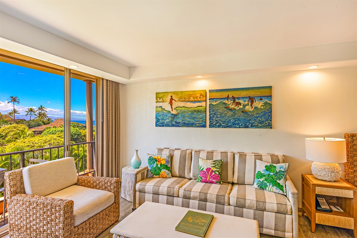 Bright living area with floor to ceiling windows
