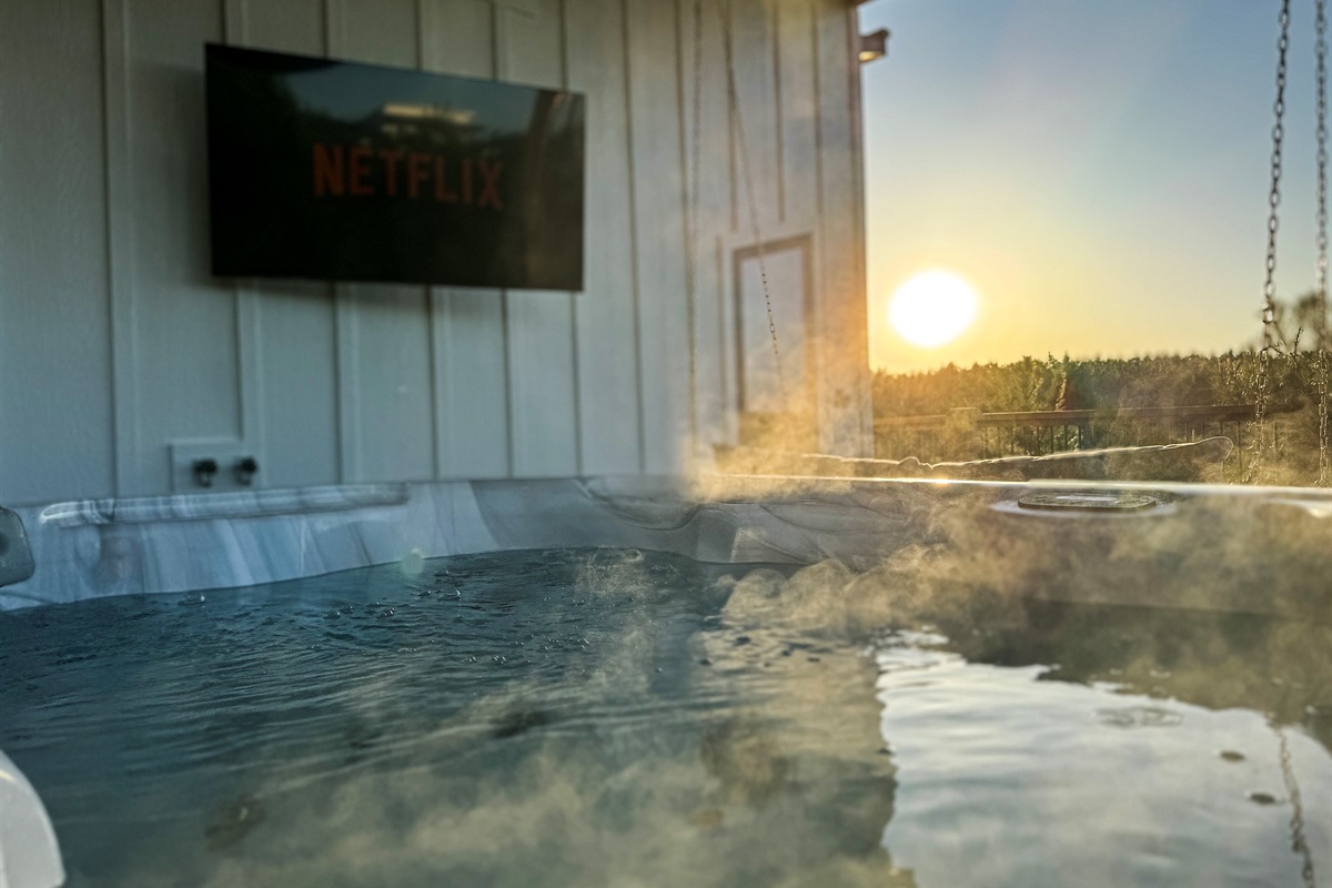 A bubbling hot tub on the upper deck with miles of gorgeous views. Perfect for unwinding after a day of adventure, soaking under the stars, or simply relaxing in the fresh mountain air.