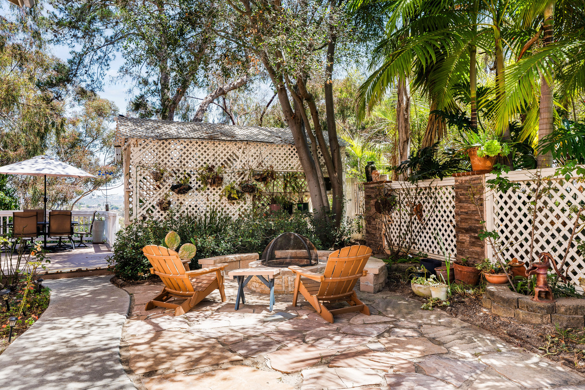 Private Side Yard with Separate Sitting Area Adjacent to the Patio Deck
