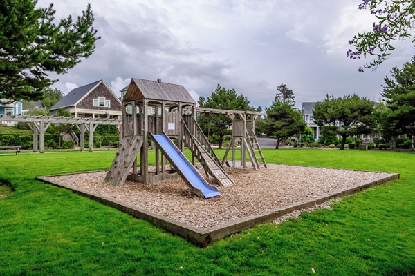 Another play area just a short stroll from home with slides and climbing structures providing multiple options for kids to explore.