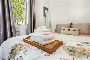Towel decoration in queen bed