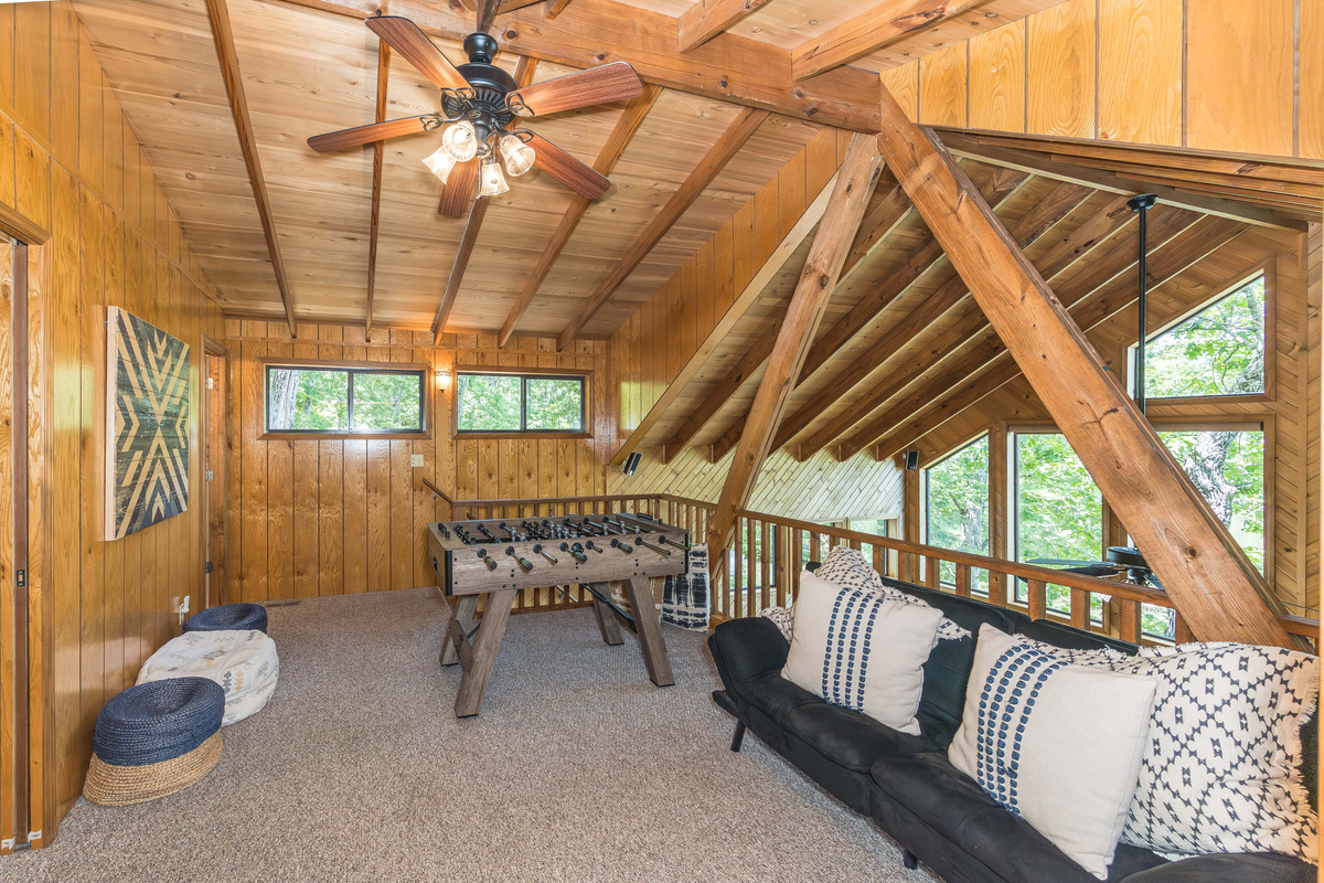 Loft game area overlooking the great room below.