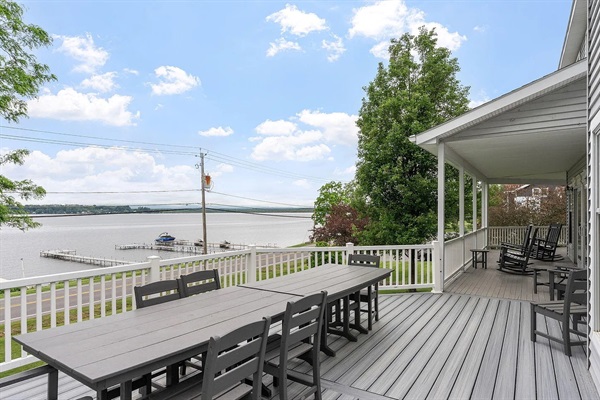Enjoy lakeside dining on the spacious firs-floor deck featuring a large double dining table and beautiful Saratoga Lake views.