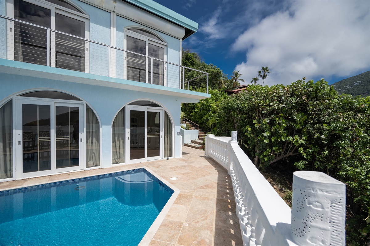 These stairs lead up to the main floor of the villa, along the parking area and front door entrance.